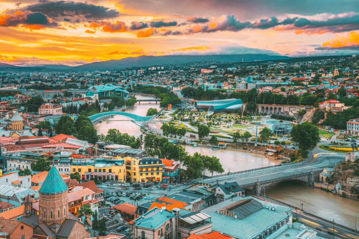 Tbilisi, Georgia. Evening View Of Tbilisi Skyline At Colorful Sunset. Summer Cityscape.
